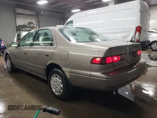 1999 Toyota Camry LE с VIN 4T1BG22K4XU469265, выставлен на аукционе Copart как лот 80112794 с пробегом 184 782 миль миль и Списание • Salvage title. История ставок и продаж доступна на DreamBid. Изображение 2.