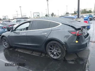 2018 Tesla Model 3 Long Range Battery with VIN 5YJ3E1EB1JF149423, listed as a IAAI auction lot 41896090 with 158,787 mi miles and . Bid and sale history available at DreamBid. Image 15.
