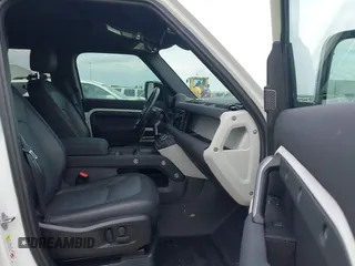 2023 Land Rover Defender X-Dynamic SE с VIN SALE27EUXP2114986, выставлен на аукционе IAAI как лот 42302857 с пробегом 29 384 миль миль и . История ставок и продаж доступна на DreamBid. Изображение 5.