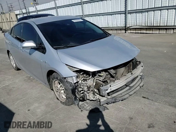 2017 Toyota Prius Plus z VIN JTDKARFP7H3051097, wystawiony jako Copart lot #60288305 z przebiegiem 196 867 mil mil oraz Szkoda całkowita • Salvage title. Historia ofert i sprzedaży dostępna na DreamBid. Obrazek 14.