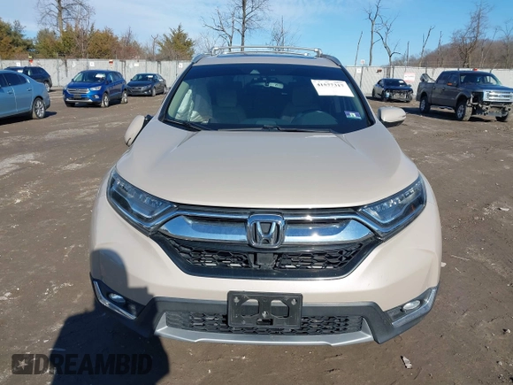 2017 Honda CR-V Touring with VIN 5J6RW2H94HL013536, listed as a IAAI auction lot 41577317 with 97,132 mi miles. Bid and sale history available at carsss.com. Image 12.