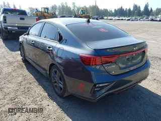 2021 Kia Forte GT-Line with VIN 3KPF34AD2ME418132, listed as a IAAI auction lot 42736894 with 58,901 mi miles and . Bid and sale history available at DreamBid. Image 3.