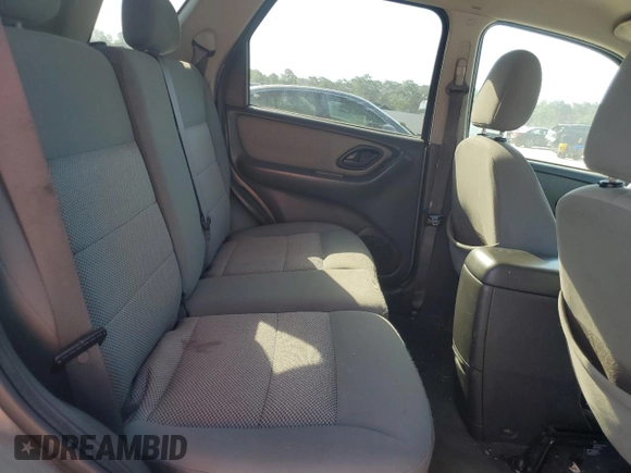 2005 Ford Escape Hybrid z VIN 1FMCU95HX5KB95634, wystawiony jako Copart lot #56513595 z przebiegiem 228 188 mil mil oraz Czysty tytuł • Clean title. Historia ofert i sprzedaży dostępna na DreamBid. Obrazek 11.