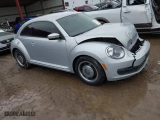 2012 Volkswagen Beetle 2.5L PZEV with VIN 3VWJP7ATXCM601206, listed as a IAAI auction lot 41733311 with 111,742 mi miles. Bid and sale history available at carsss.com. Image 1.