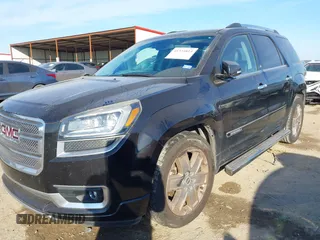 2016 GMC Acadia Denali with VIN 1GKKRTKDXGJ159049, listed as a IAAI auction lot 41334814 with 150,351 mi miles. Bid and sale history available at carsss.com. Image 2.