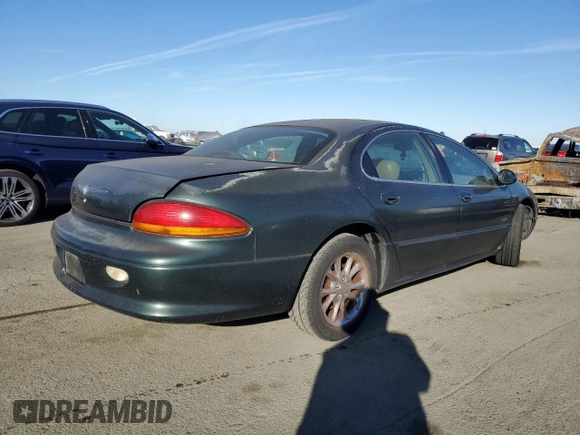 2001 Chrysler LHS z VIN 2C3AC56G31H606648, wystawiony jako Copart lot #77123814 z przebiegiem 83 574 mil mil oraz Tytuł czysty. Historia ofert i sprzedaży dostępna na DreamBid. Obrazek 3.