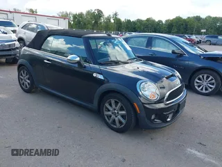 2012 MINI Convertible S z VIN WMWZP3C56CT250533, wystawiony jako IAAI lot #41506301 z przebiegiem 89 854 mil mil oraz . Historia ofert i sprzedaży dostępna na DreamBid. Obrazek 1.