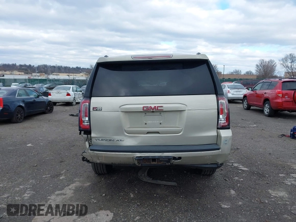 2015 GMC Yukon XL SLT with VIN 1GKS2HKC7FR100534, listed as a IAAI auction lot 41229658 with 207,947 mi miles. Bid and sale history available at carsss.com. Image 15.