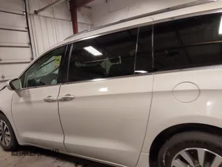 2021 Chrysler Pacifica Touring L with VIN 2C4RC1BG7MR531772, listed as a IAAI auction lot 41834392 with 156,123 mi miles and . Bid and sale history available at DreamBid. Image 14.