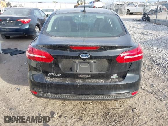 2016 Ford Focus SE z VIN 1FADP3FEXGL310270, wystawiony jako IAAI lot #40956503 z przebiegiem 156 812 mil mil oraz . Historia ofert i sprzedaży dostępna na DreamBid. Obrazek 17.