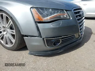 2011 Audi A8 with VIN WAUAVAFD5BN021080, listed as a IAAI auction lot 41223418 with 80,538 mi miles and . Bid and sale history available at DreamBid. Image 12.