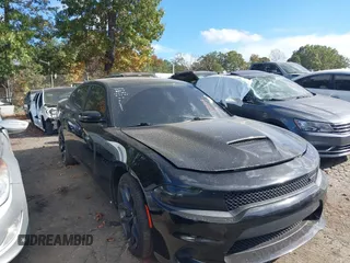 2021 Dodge Charger R/T with VIN 2C3CDXCT1MH574807, listed as a IAAI auction lot 40715181 with 51,620 mi miles and . Bid and sale history available at carsss.com. Image 1.