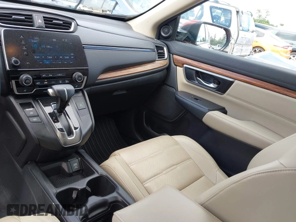 2018 Honda CR-V EX-L z VIN 2HKRW2H83JH651686, wystawiony jako IAAI lot #42356284 z przebiegiem 60 550 mil mil oraz . Historia ofert i sprzedaży dostępna na DreamBid. Obrazek 19.