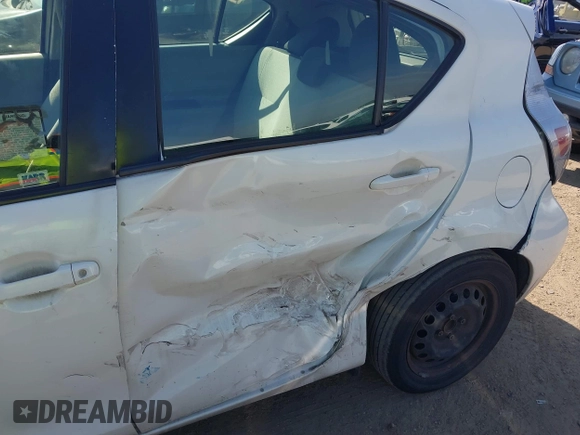 2014 Toyota Prius One with VIN JTDKDTB35E1082542, listed as a IAAI auction lot 42159682 with 166,231 mi miles and . Bid and sale history available at DreamBid. Image 6.