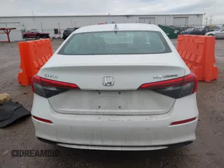 2023 Honda Civic Touring z VIN 2HGFE1F93PH304731, wystawiony jako IAAI lot #41675935 z przebiegiem 27 435 mil mil oraz . Historia ofert i sprzedaży dostępna na DreamBid. Obrazek 16.