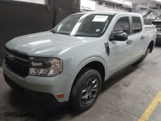 2023 Ford Maverick XL with VIN 3FTTW8E31PRA40014, listed as a IAAI auction lot 41611861 with 42,437 mi miles. Bid and sale history available at carsss.com. Image 2.