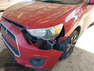 2014 Mitsubishi Outlander Sport ES with VIN 4A4AP3AU4EE004073, listed as a IAAI auction lot 42100709 with 170,788 mi miles. Bid and sale history available at carsss.com. Image 6.