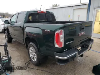 2016 GMC Canyon 4WD SLT with VIN 1GTG6CE39G1107246, listed as a Copart auction lot 82300084 with 122,531 mi miles and Salvage Title. Bid and sale history available at carsss.com. Image 2.