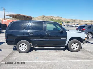 2001 Chevrolet Tahoe LT with VIN 1GNEC13T31R122882, listed as a IAAI auction lot 41999271 with 211,687 mi miles. Bid and sale history available at carsss.com. Image 14.