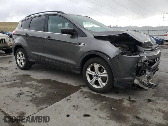 2016 Ford Escape SE with VIN 1FMCU9G97GUA48555, listed as a Copart auction lot 49285395 with 106,941 mi miles and Salvage Title. Bid and sale history available at DreamBid. Image 4.
