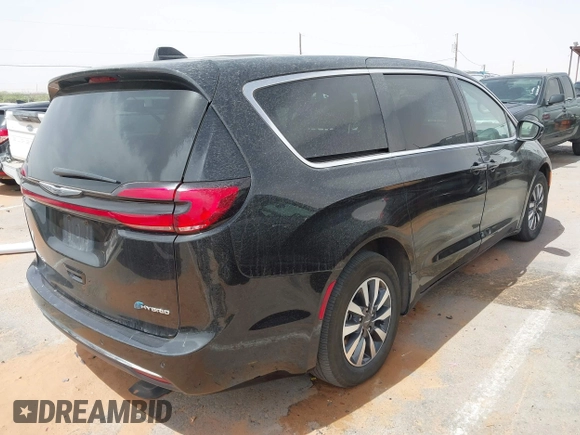 2023 Chrysler Pacifica Hybrid Touring L с VIN 2C4RC1L78PR551371, выставлен на аукционе IAAI как лот 42235410 с пробегом 49 519 миль миль и . История ставок и продаж доступна на DreamBid. Изображение 4.
