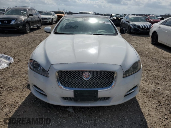 2014 Jaguar XJ with VIN SAJWA2GZ3E8V70365, listed as a Copart auction lot 42545995 with 65,649 mi miles and Salvage Title. Bid and sale history available at carsss.com. Image 5.