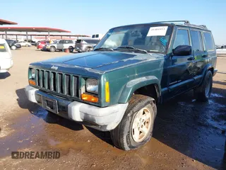 1999 Jeep Cherokee Sport with VIN 1J4FT68S6XL579735, listed as a IAAI auction lot 41484413 with 146,862 mi miles and . Bid and sale history available at DreamBid. Image 2.