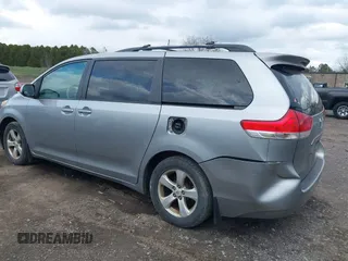 2011 Toyota Sienna LE AAS with VIN 5TDKK3DC8BS051934, listed as a IAAI auction lot 42040204 with 207,863 mi miles. Bid and sale history available at carsss.com. Image 3.
