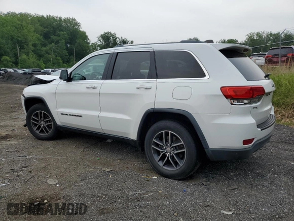 2018 Jeep Grand Cherokee Laredo E with VIN 1C4RJEAGXJC430096, listed as a Copart auction lot 57391405 with 89,248 mi miles and Salvage title. Bid and sale history available at DreamBid. Image 2.
