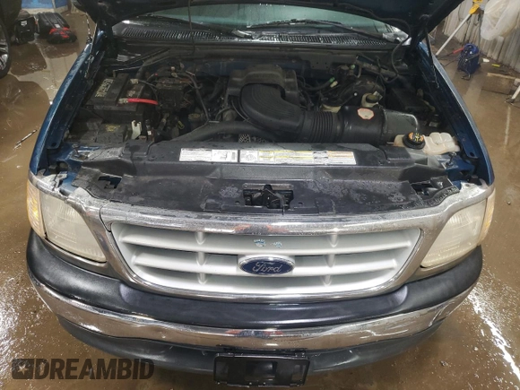 1999 Ford F-150 z VIN 1FTRF17W6XNB72620, wystawiony jako Copart lot #50977015 z przebiegiem Nie podano mil oraz Szkoda całkowita • Salvage title. Historia ofert i sprzedaży dostępna na DreamBid. Obrazek 11.