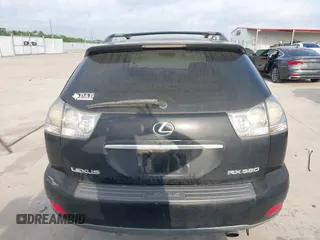 2008 Lexus RX with VIN 2T2HK31U38C064322, listed as a IAAI auction lot 42074366 with 241,459 mi miles. Bid and sale history available at carsss.com. Image 16.