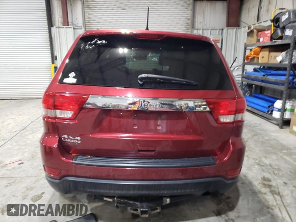 2013 Jeep Grand Cherokee Laredo с VIN 1C4RJFAG9DC619381, выставлен на аукционе Copart как лот 41836075 с пробегом 202 766 миль миль и Списание • Salvage title. История ставок и продаж доступна на DreamBid. Изображение 6.