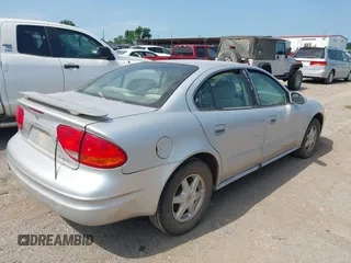 2002 Oldsmobile Alero GL1 z VIN 1G3NL52F32C213795, wystawiony jako IAAI lot #42310950 z przebiegiem Nie podano mil oraz . Historia ofert i sprzedaży dostępna na DreamBid. Obrazek 4.