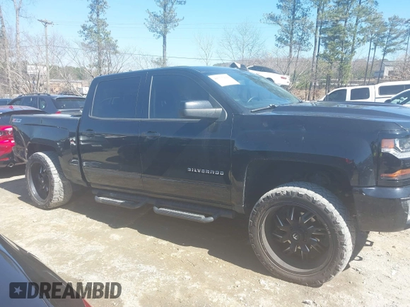 2017 Chevrolet Silverado 1500 LT with VIN 3GCUKREC1HG358752, listed as a IAAI auction lot 41775110 with 150,528 mi miles and . Bid and sale history available at DreamBid. Image 13.