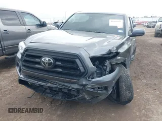 2023 Toyota Tacoma SR with VIN 3TYCZ5AN5PT138770, listed as a IAAI auction lot 41461423 with 19,785 mi miles and . Bid and sale history available at DreamBid. Image 12.
