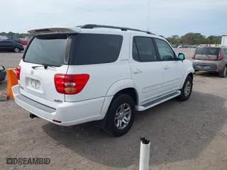 2004 Toyota Sequoia Limited with VIN 5TDZT38A04S236082, listed as a IAAI auction lot 41598592 with 104,042 mi miles. Bid and sale history available at carsss.com. Image 4.