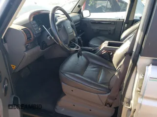 2002 Land Rover Discovery with VIN SALTW12452A769021, listed as a Copart auction lot 71550244 with 83,679 mi miles and Salvage Title. Bid and sale history available at DreamBid. Image 7.
