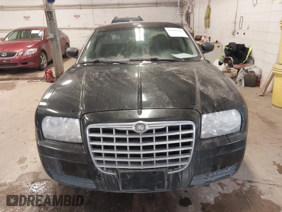 2007 Chrysler 300 with VIN 2C3LA43R17H860639, listed as a IAAI auction lot 41481326 with 163,837 mi miles. Bid and sale history available at carsss.com. Image 12.