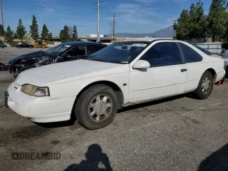 1995 Ford Thunderbird LX with VIN 1FALP62W8SH199645, listed as a Copart auction lot 49417485 with 158,571 mi miles and Clean Title. Bid and sale history available at carsss.com. Image 1.