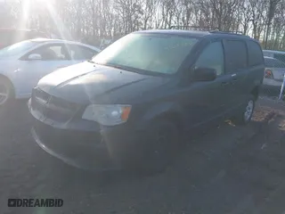 2011 Dodge Grand Caravan Express with VIN 2D4RN4DG9BR719279, listed as a IAAI auction lot 41648483 with 999,999 mi miles. Bid and sale history available at carsss.com. Image 2.