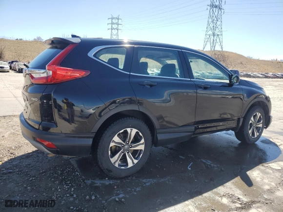 2018 Honda CR-V LX with VIN 2HKRW6H38JH211412, listed as a Copart auction lot 50433105 with 100,487 mi miles and Salvage Title. Bid and sale history available at carsss.com. Image 3.