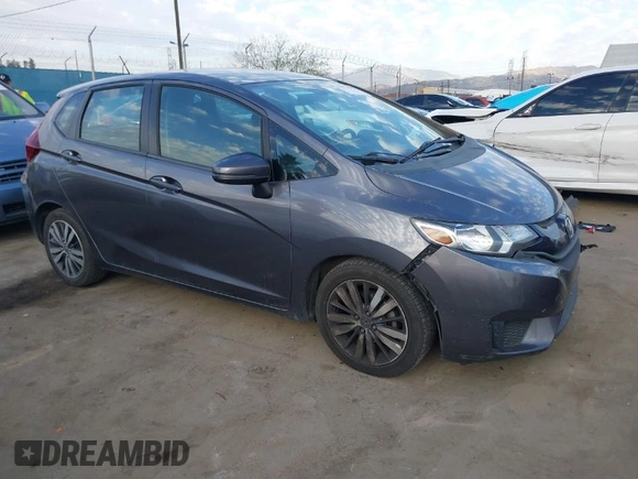 2015 Honda Fit LX with VIN 3HGGK5H5XFM719477, listed as a IAAI auction lot 41671194 with 145,876 mi miles. Bid and sale history available at carsss.com. Image 1.