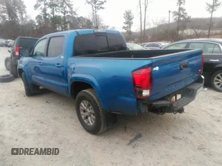 2018 Toyota Tacoma SR5 with VIN 3TMAZ5CN3JM066409, listed as a IAAI auction lot 41204775 with 75,000 mi miles and . Bid and sale history available at DreamBid. Image 3.