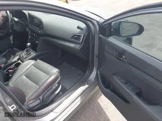 2018 Hyundai Elantra Sport with VIN KMHD04LB0JU597002, listed as a IAAI auction lot 41983087 with 95,583 mi miles. Bid and sale history available at carsss.com. Image 5.