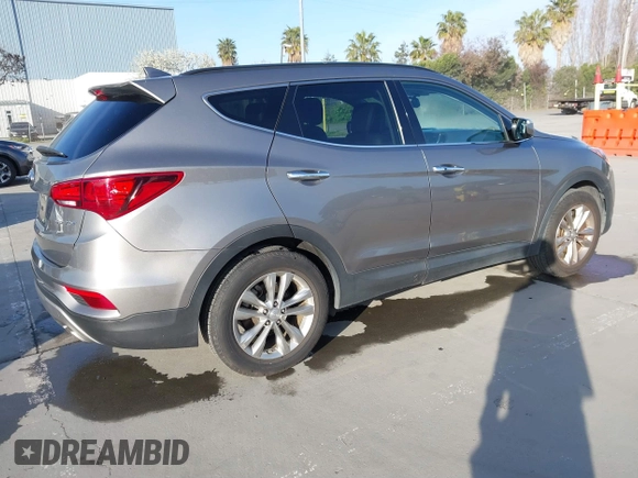 2017 Hyundai Santa Fe Sport 2.0T with VIN 5XYZU4LA7HG406516, listed as a IAAI auction lot 41847977 with 105,299 mi miles. Bid and sale history available at carsss.com. Image 4.