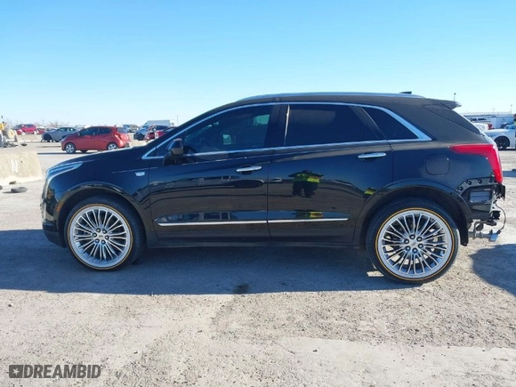 2017 Cadillac XT5 FWD with VIN 1GYKNARS3HZ122969, listed as a IAAI auction lot 41421230 with 116,603 mi miles. Bid and sale history available at carsss.com. Image 14.