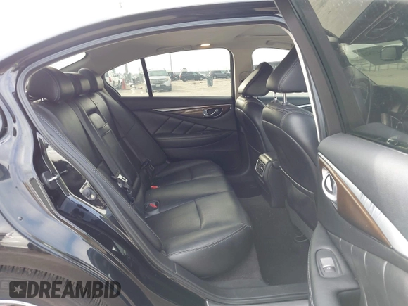 2015 Infiniti Q50 z VIN JN1BV7AP3FM335871, wystawiony jako IAAI lot #41472424 z przebiegiem 127 383 mil mil oraz . Historia ofert i sprzedaży dostępna na DreamBid. Obrazek 8.