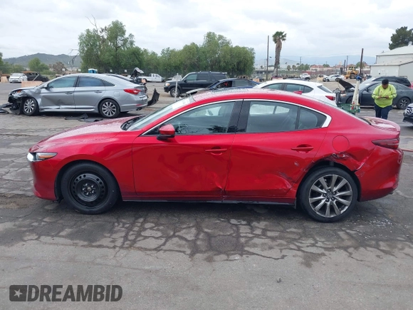2021 Mazda 3 with VIN JM1BPBDL6M1305765, listed as a IAAI auction lot 42063684 with 61,011 mi miles and . Bid and sale history available at DreamBid. Image 14.