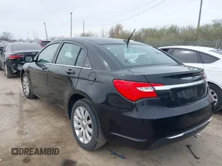 2013 Chrysler 200 Touring with VIN 1C3CCBBB4DN602086, listed as a IAAI auction lot 41932742 with 151,366 mi miles and . Bid and sale history available at carsss.com. Image 3.