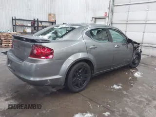 2013 Dodge Avenger SE with VIN 1C3CDZAB1DN581303, listed as a IAAI auction lot 41942469 with 123,330 mi miles. Bid and sale history available at carsss.com. Image 4.